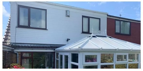 Cladding and conservatory roof cleaned back to white